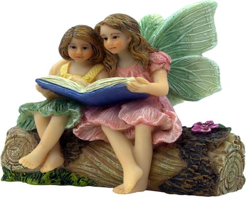 une Paire De Figurines De Fées