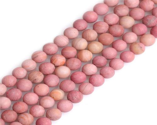 en uppsättning av neonkvarts och rosa Rhodonitpärlor Shgbeads